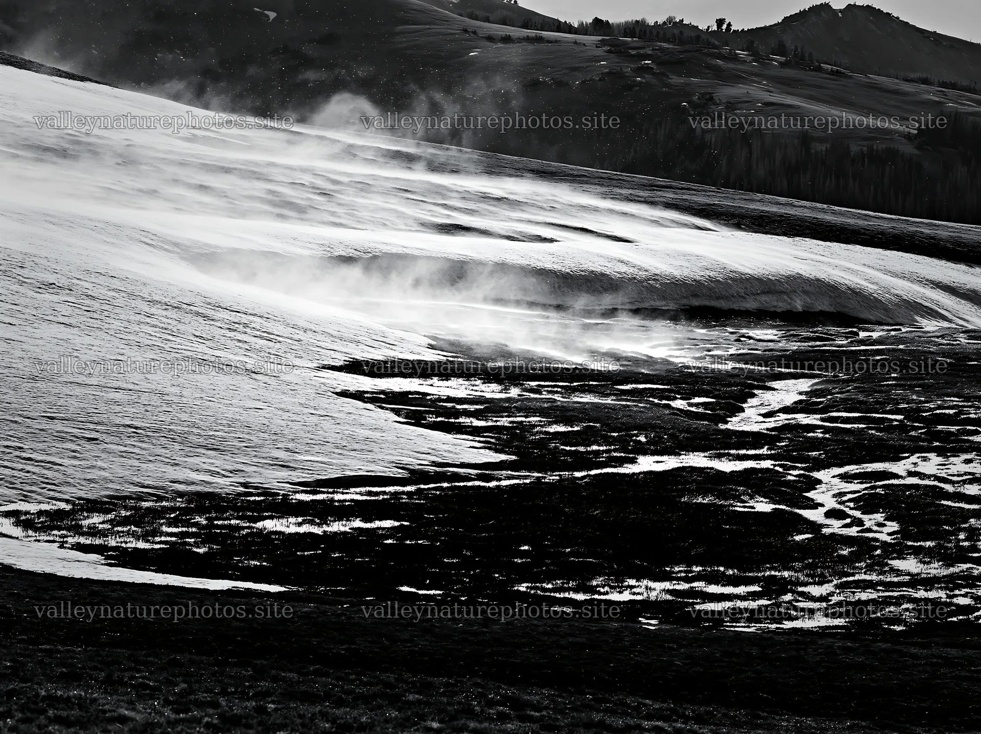 Black and white landscape of meadow with snow and water flow – nature photography 9174x6866