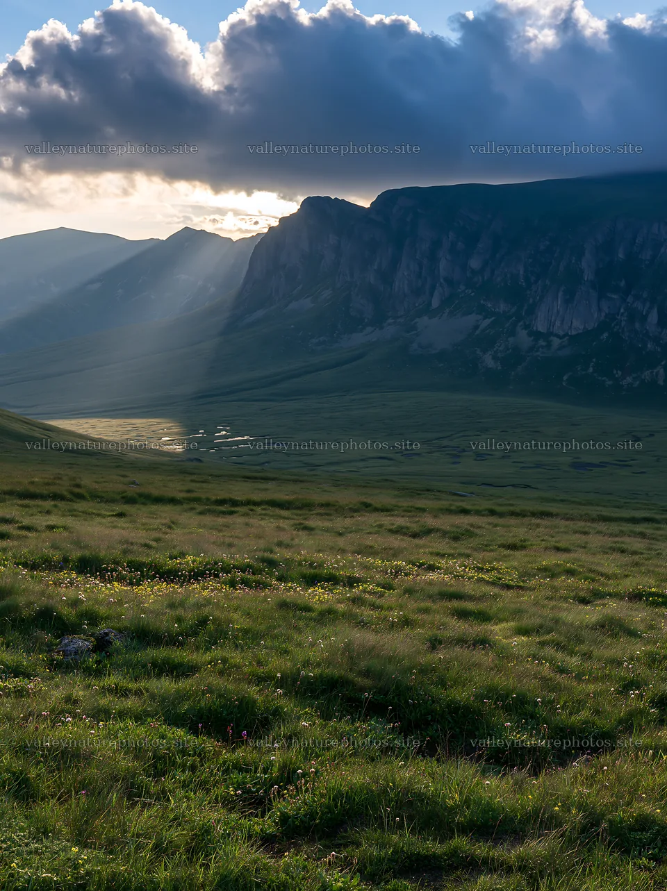 Light rays through clouds over Bucegi Mountains meadow – nature photography 6866x9174