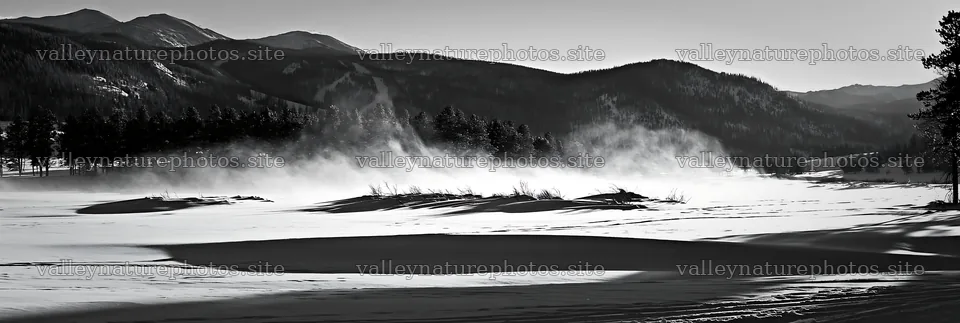 Snowy Rocky Mountain Park meadow with wind-blown snow – nature photography 13690x4602