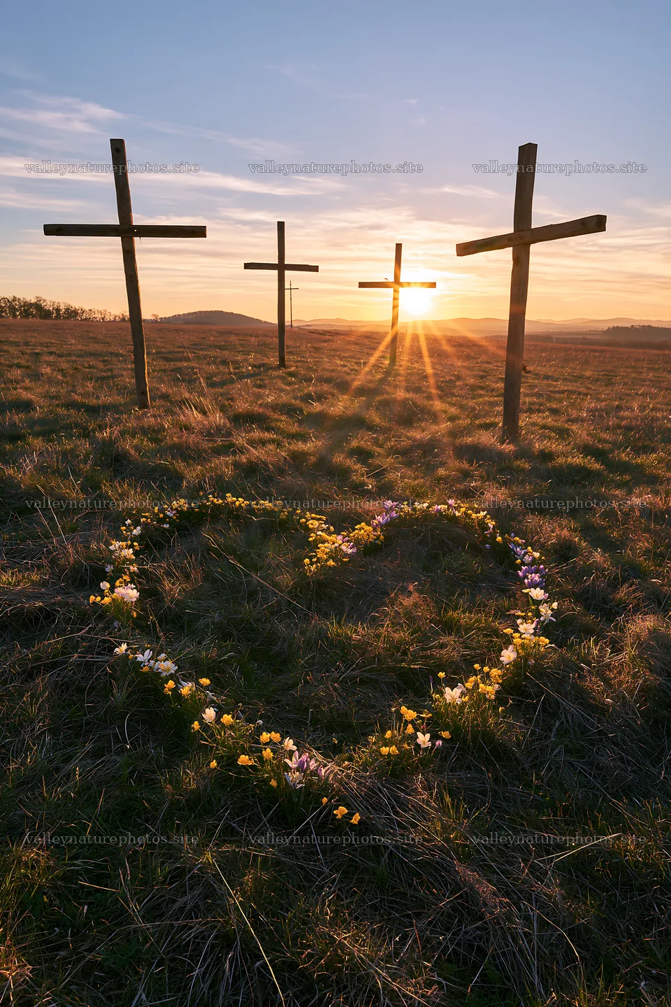 Four Christian crosses in winter meadow at sunset – nature photography 6480x9722