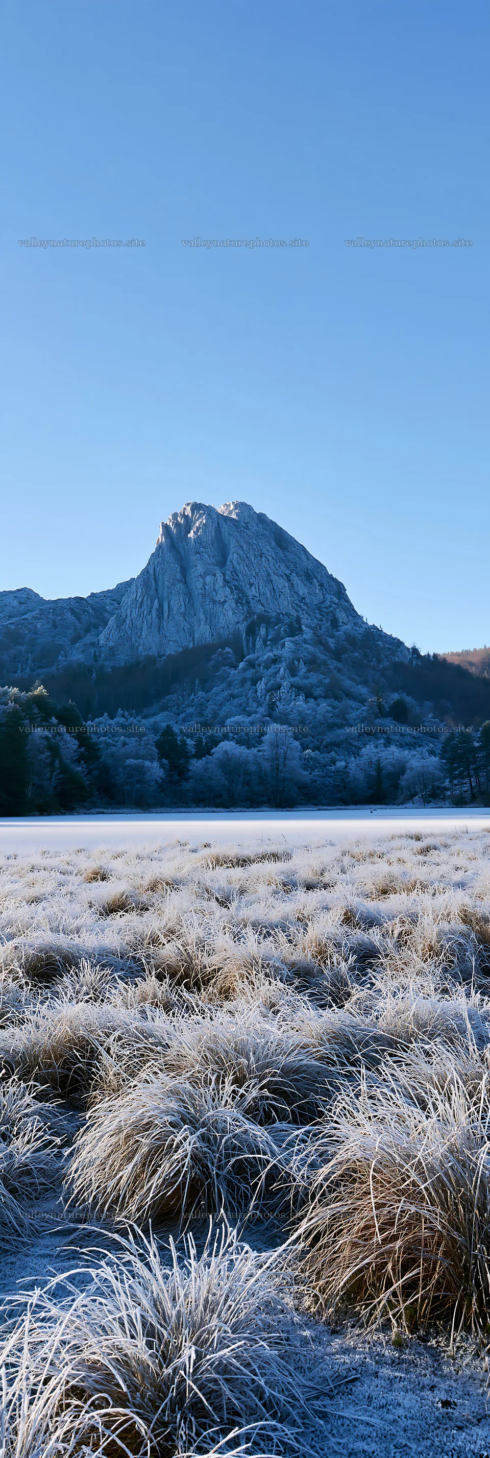 Frozen tarn meadow with mountains in the background – nature photography 4602x13690